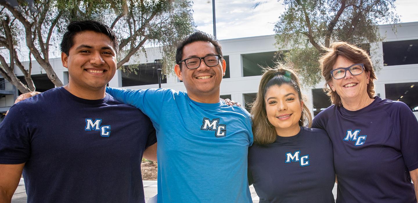 Group Photo of individuals at Moorpark College, wearing matching MC Shirts