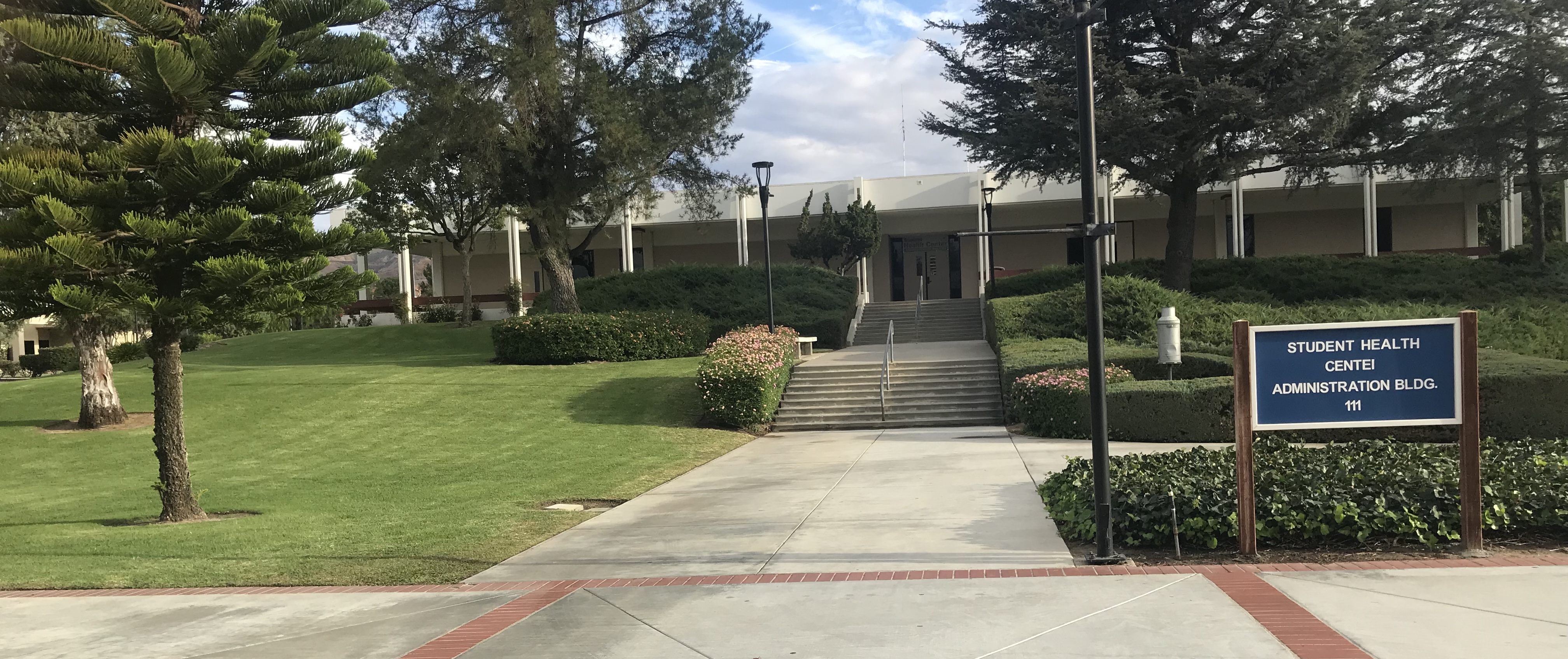 View of the Student Health Center entrance of the Administration Building from Raider Walk