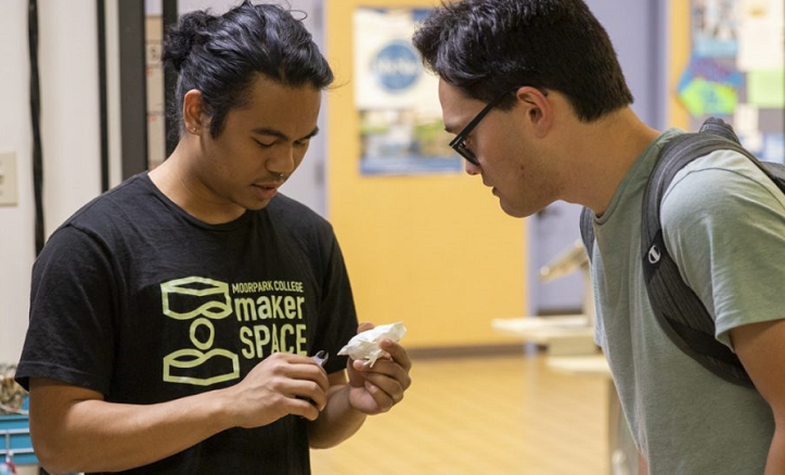 Students collaborate on a project at the MC MakerSpace