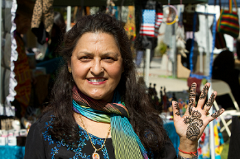 Students shop goods at the Multicultural Day event.