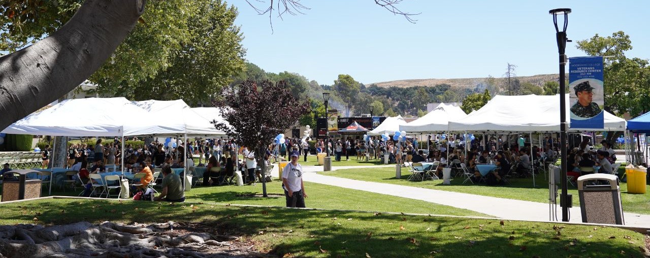 Picture of tents and tables at Fall 2019 New Student Welcome.