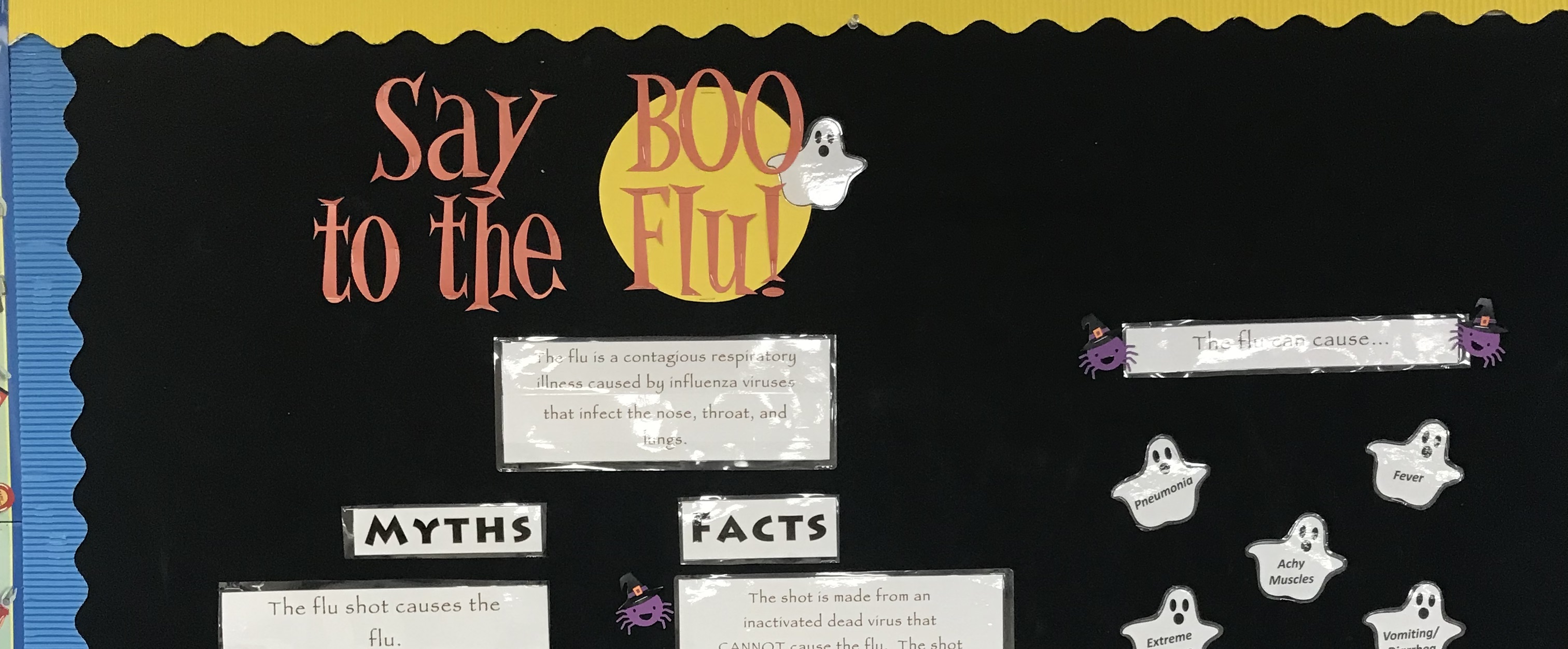 Student Health Center "Say BOO to the Flu" bulletin board in the MC Administration Building