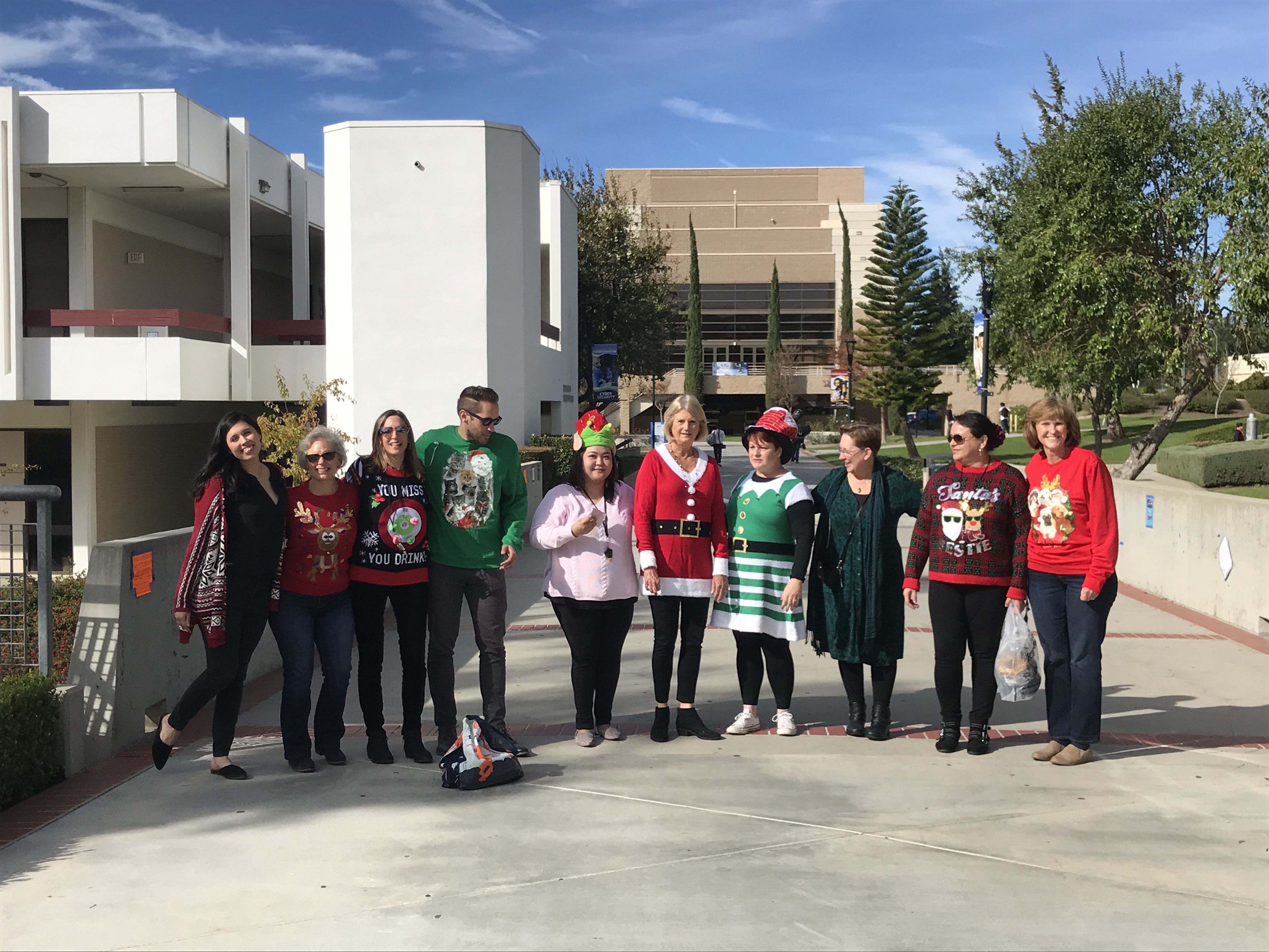 The MC Student Health Center staff dressed for the ugly Christmas sweater party.
