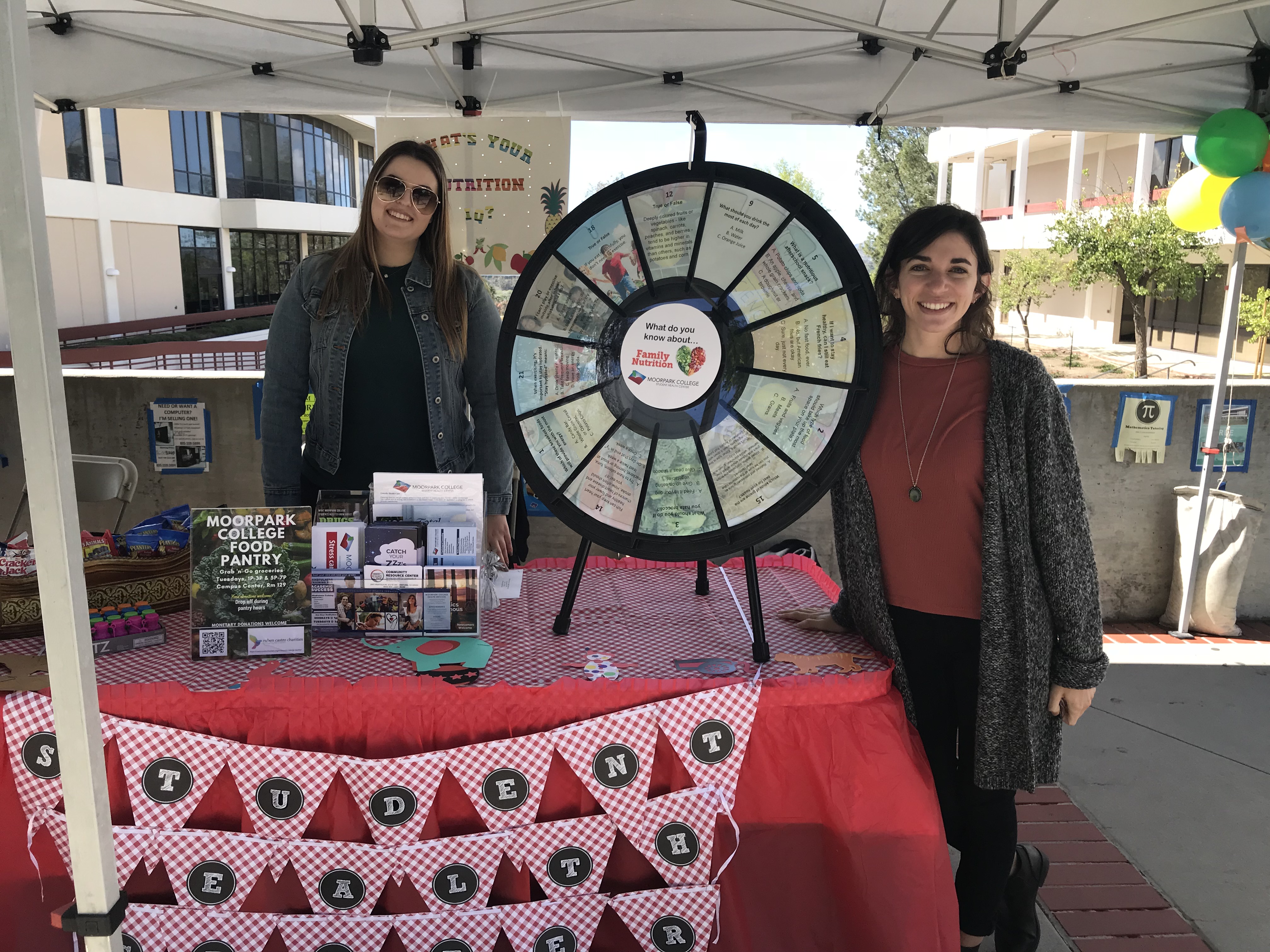 Student Health Center interns teach families about nutrition at the MC Spring Family Fun Day