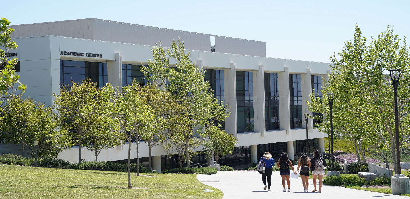 Students walking toward the Academic Center.