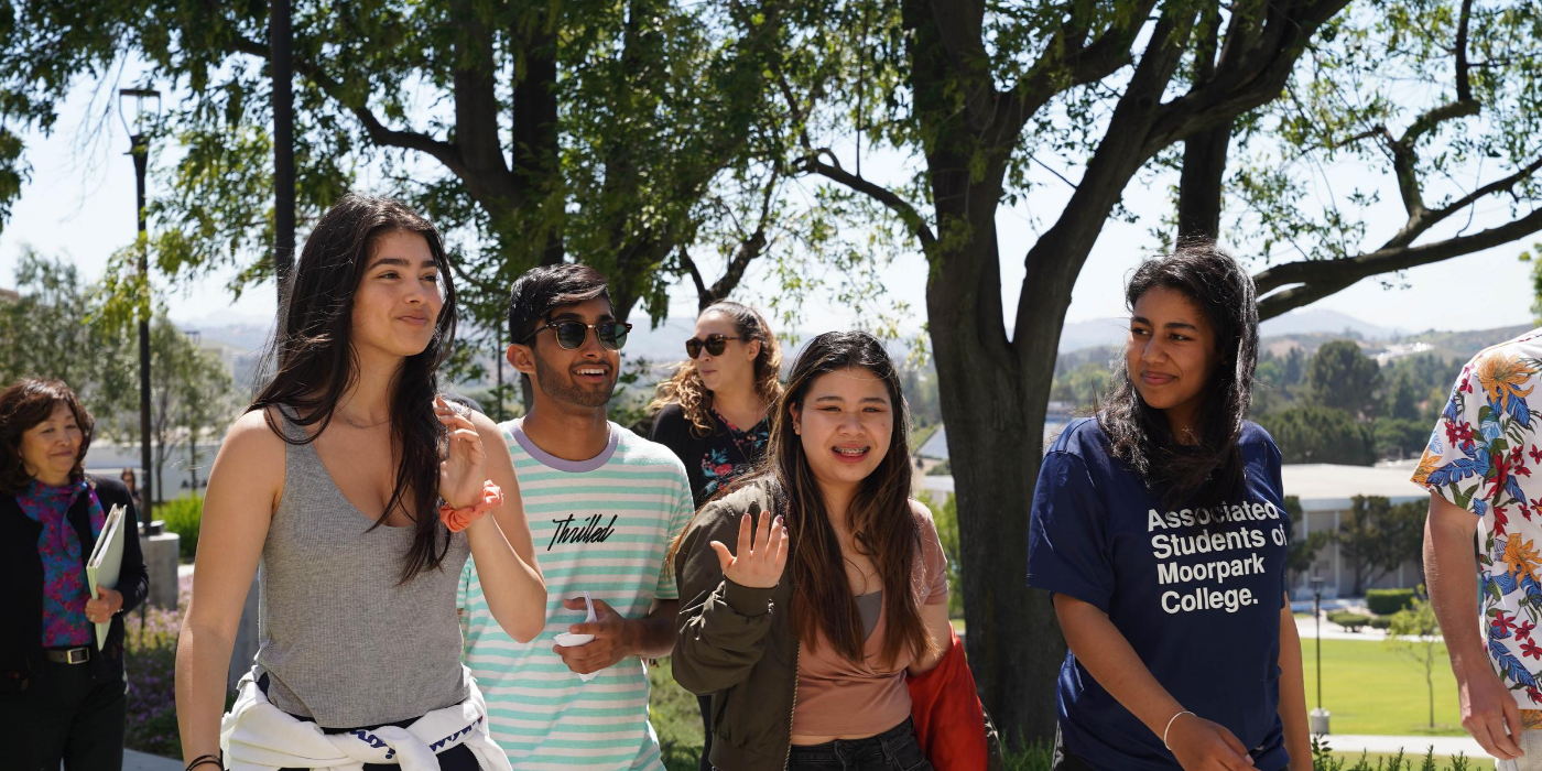 Students walk through campus.