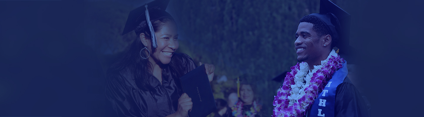 a woman and man face each other as they graduate