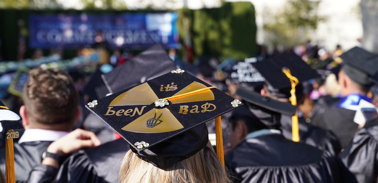A graduate's cap in the foreground reads "It's been rad," a nod to their participation in the Radiology Tech program.