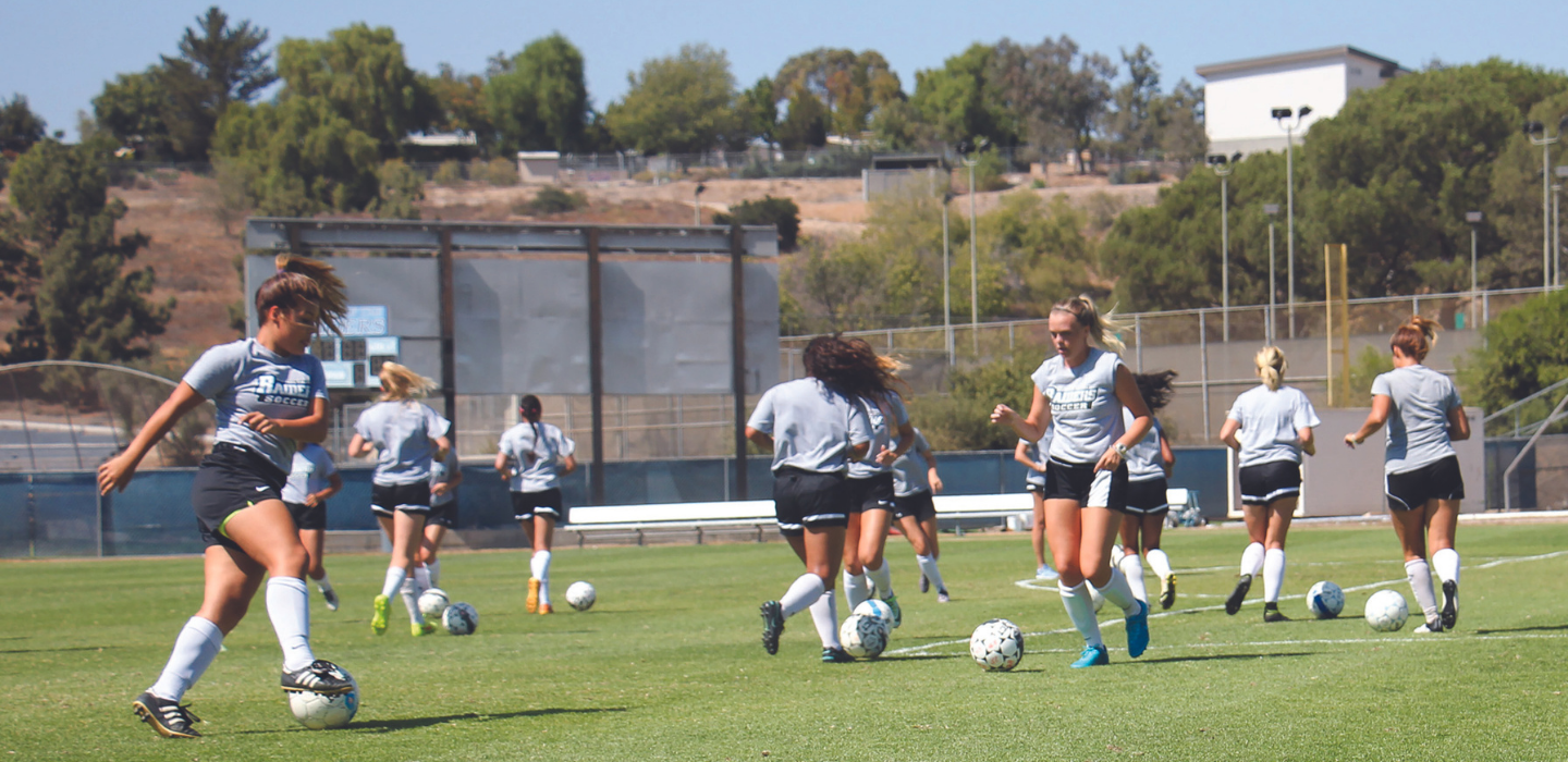 Women's soccer practicing on the field in 2010