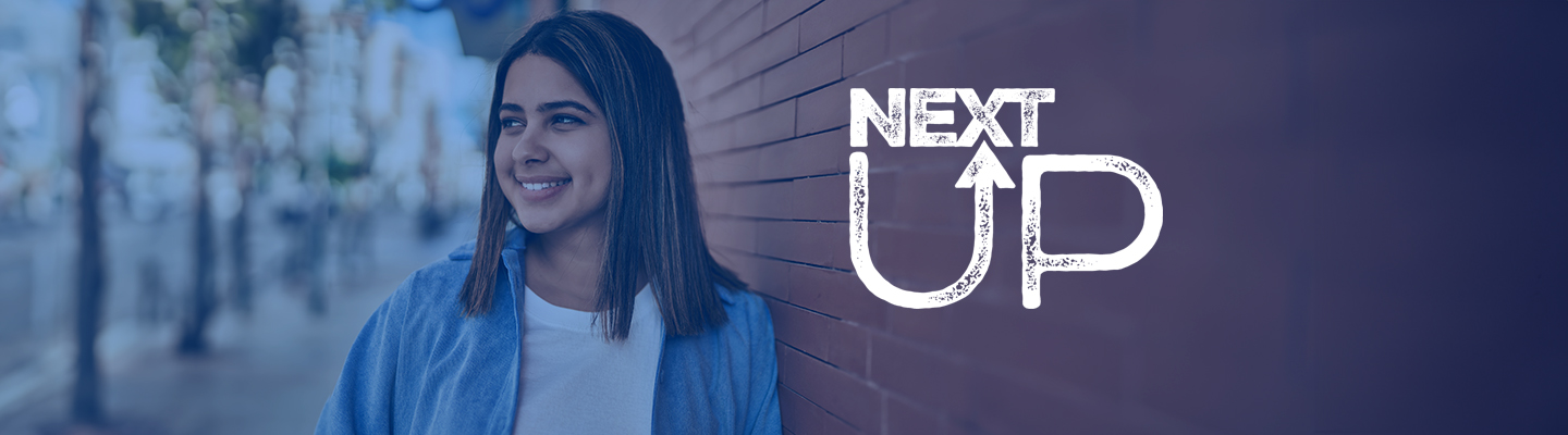 Smiling Latina with NextUp logo