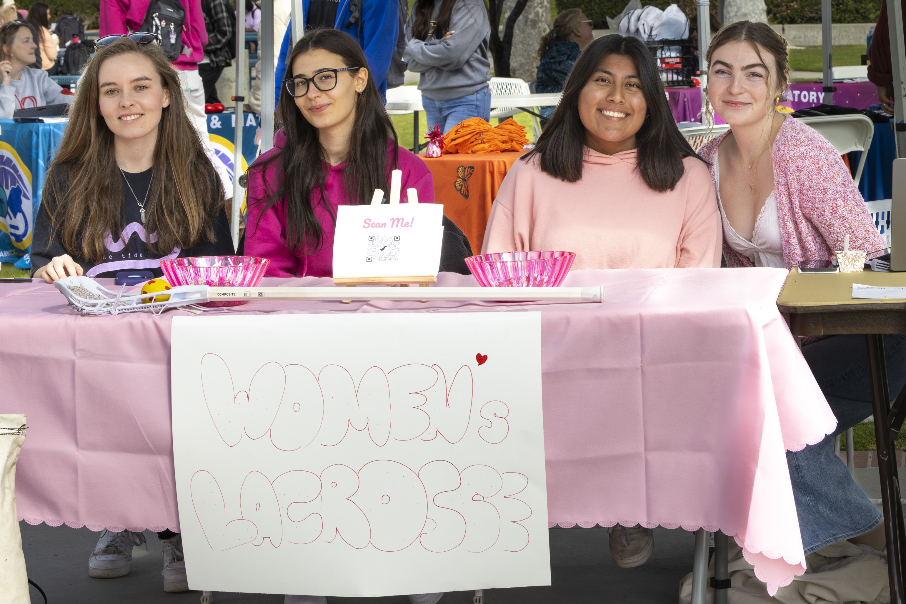Women's Lacrosse Club smile for a photo during Club Rush 2024