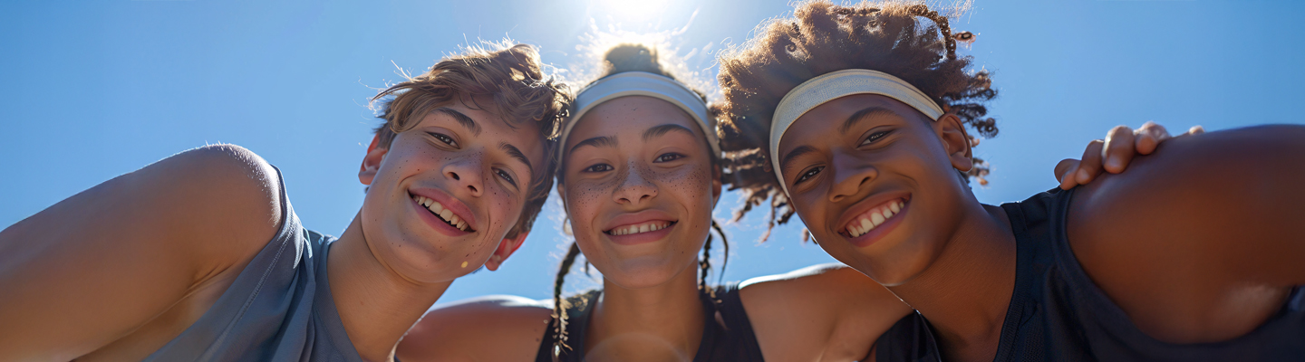3 smiling teens