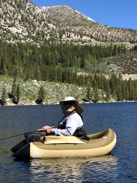 Vance in a canoe on a lake.