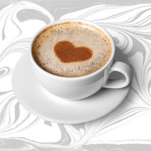 cup of coffee with heart in the foam 