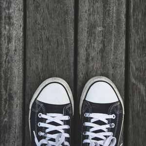 Converse shoes on wood plank