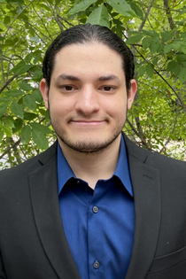 ASMC Vice President Noah David poses for a picture.