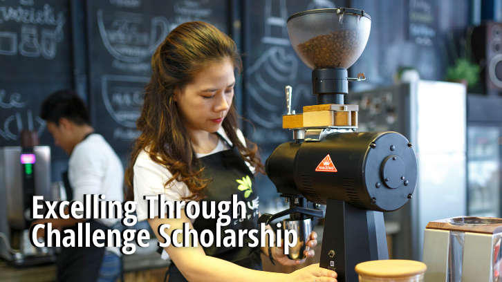 A barista prepares a drink at a coffee shop.
