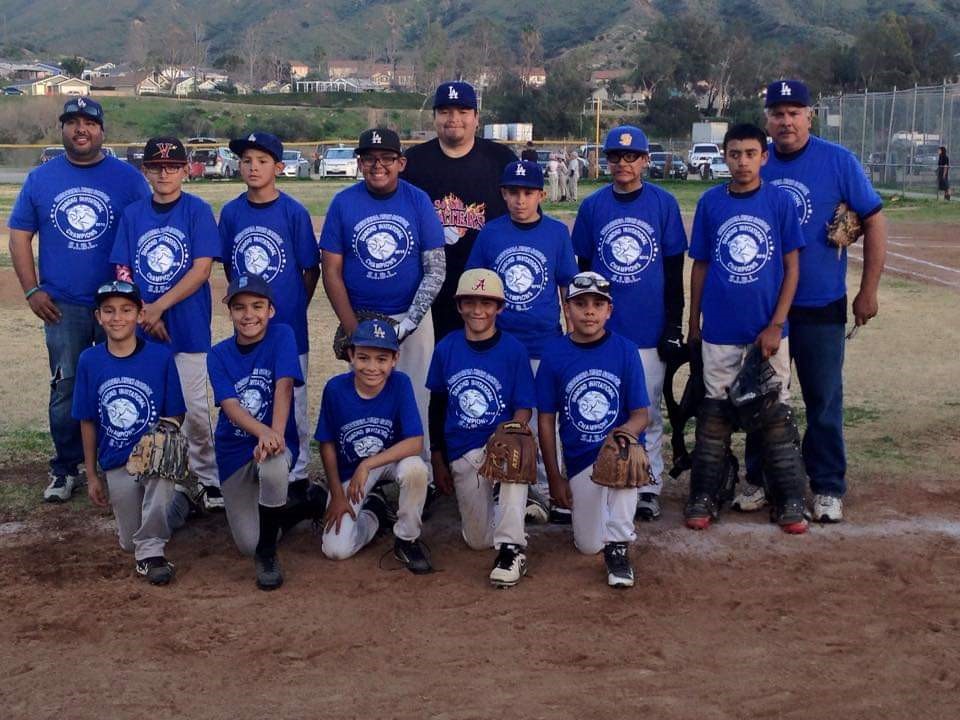 Sergio Gonzalez with Little League Baseball team