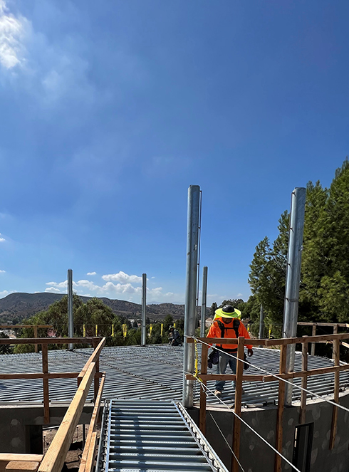 The photo shows ongoing construction of the new tiger exhibit at America's Teaching Zoo at Moorpark College from the point of view of the tiger bridge and what will be their overlook from the zoo to the college campus.