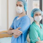 Nurses wearing scrubs and masks