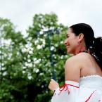 A latina woman dressed in a traditional outfit.