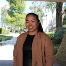 Marianne Vinas-Rogers smiles for a photo