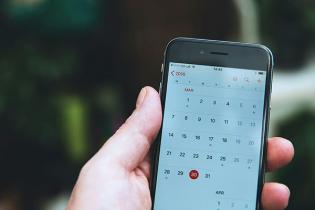 smartphone with a calendar app open