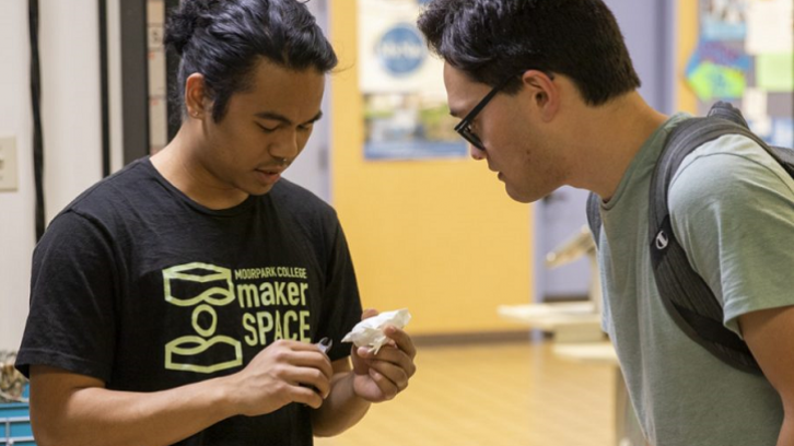 Students collaborate on a project at the MC MakerSpace