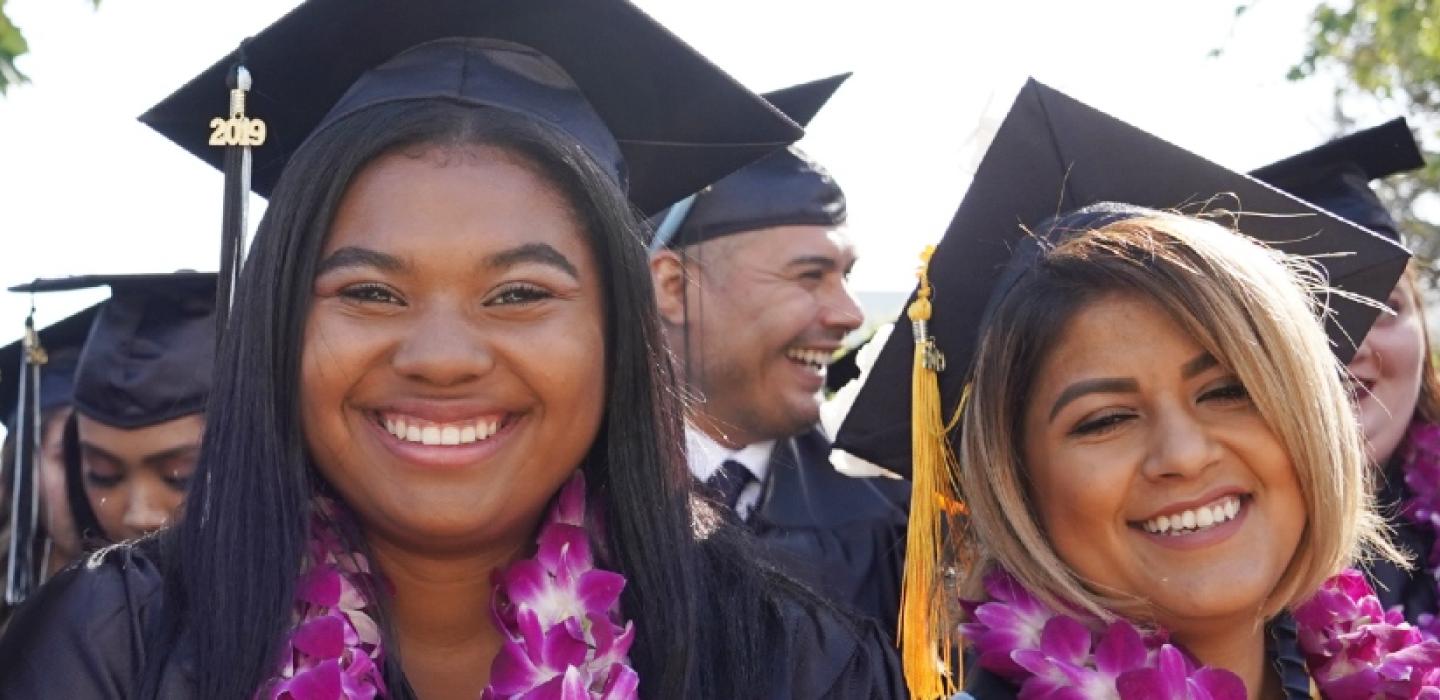 2 female graduates