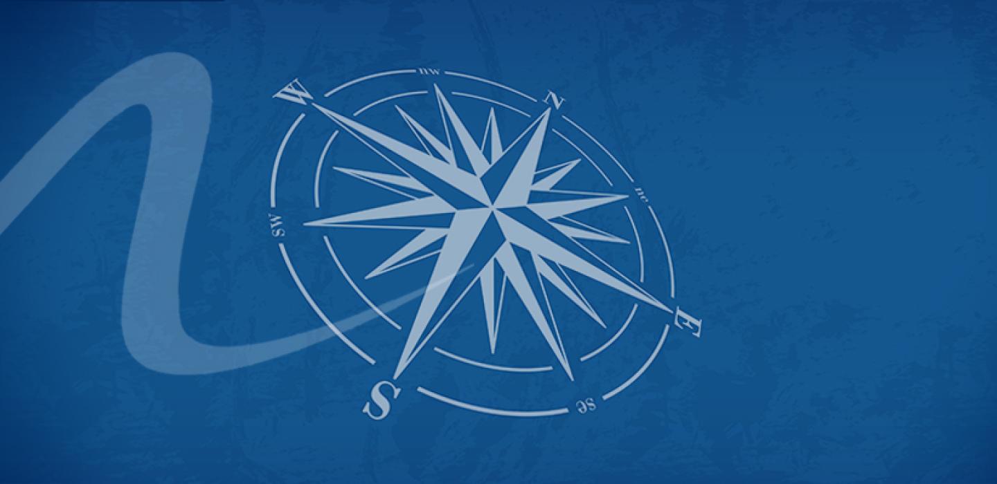 Compass on blue background