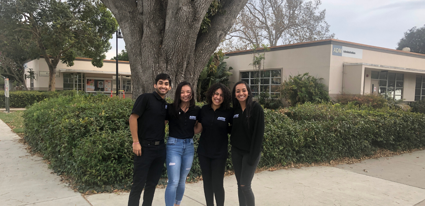 Four members of ASMC pose for a photo at leadership academy