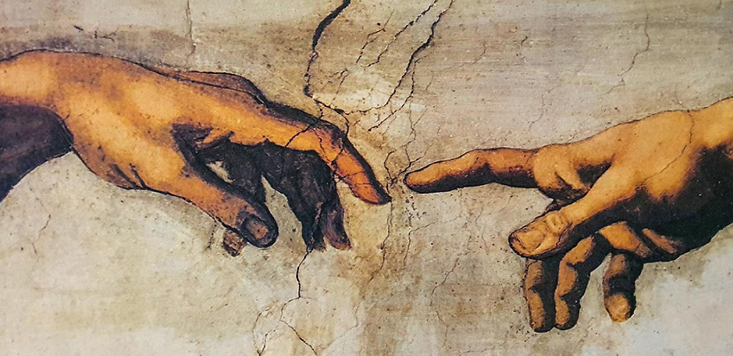 fingers touching painting