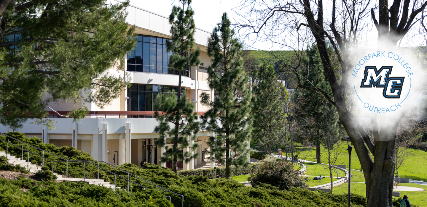 Picture of the Moorpark College library,  with trees around it. 