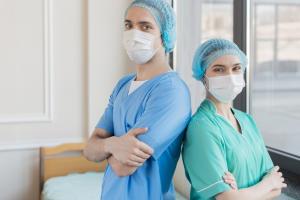 Nurses wearing scrubs and masks