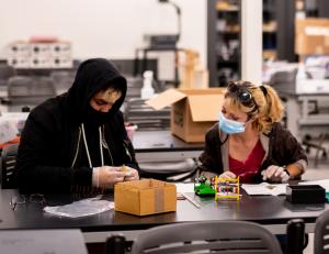 Oxnard College students in a classroom wearing masks. 